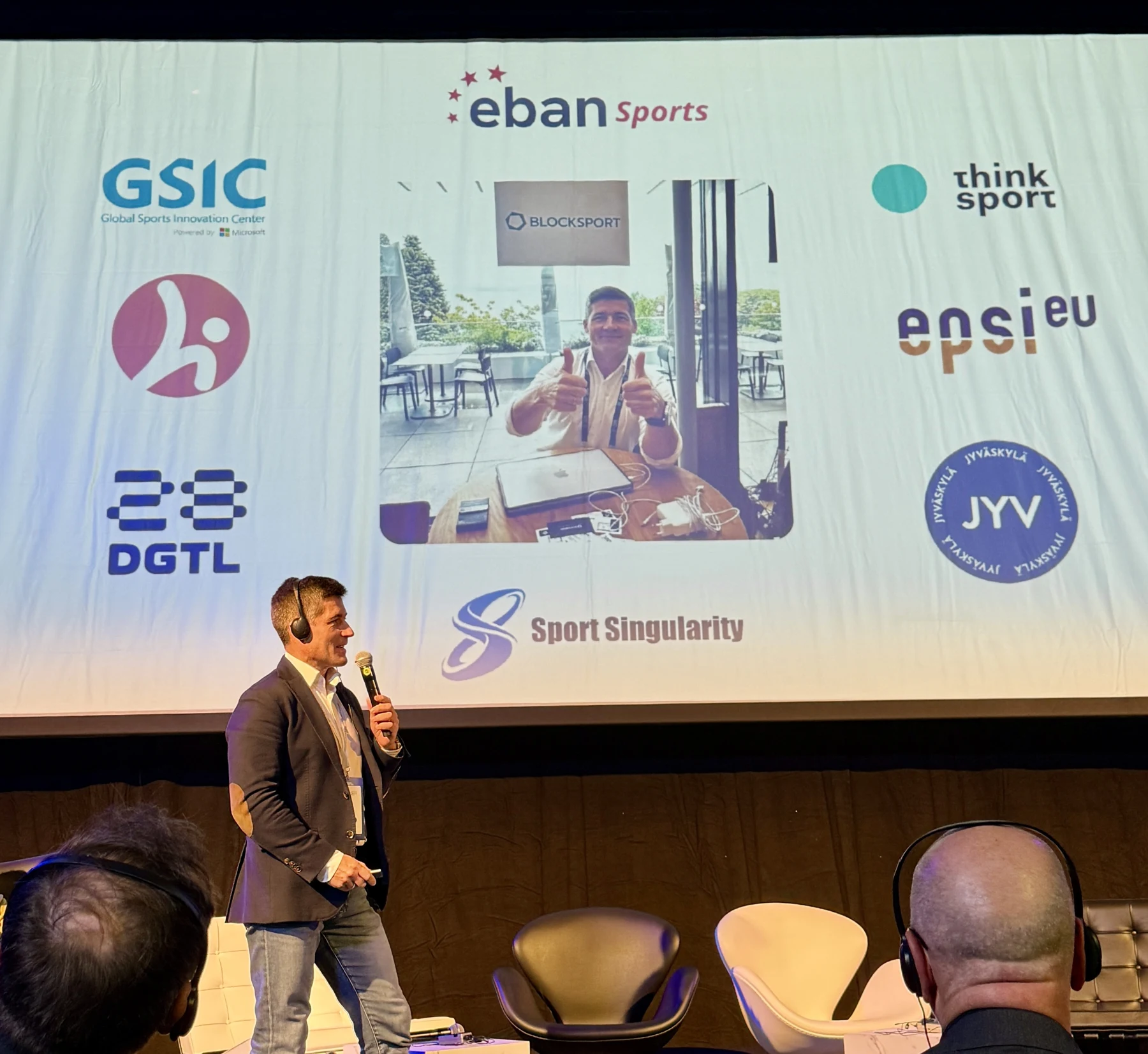 Vládimir Liúlka presenting a slide featuring BLOCKSPORT’s connections with sports innovation communities, including Sport Singularity.